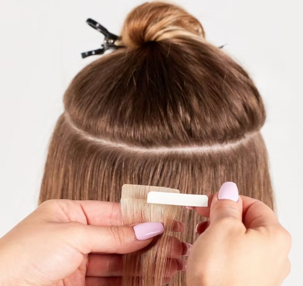 Hair extensions Toronto — invisible beaded weft extensions at Salon Dain Forest Hill